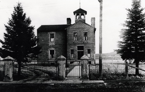 two-storey wooden school building