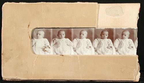 A torn filmstrip contains 5 different images of the same infant.