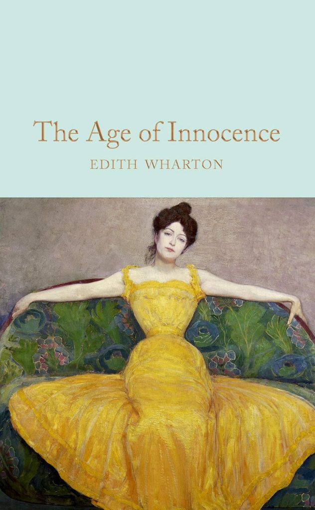 Cover art for The Age of Innocence. The painted image is of a woman in a yellow evening gown on a green sofa.