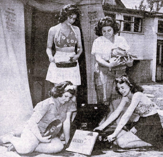 4 young women set up a campsite outside their home.