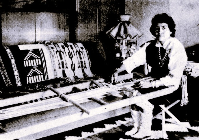 A Jemez Pueblo Indian woman demonstrates her loom.