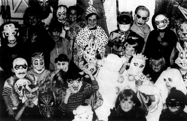A preschool poses in their Halloween costumes.