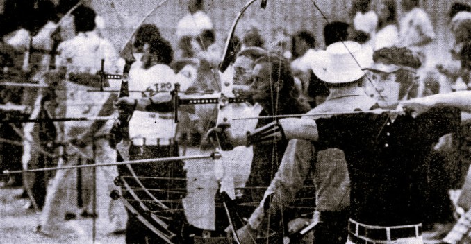 A group of archers draw their bows.