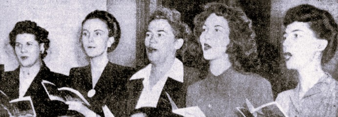 5 women sing Christmas carols.