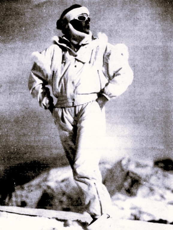 A woman models 1980s ski fashion.