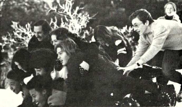 A group of high school seniors prepares to go sledding.