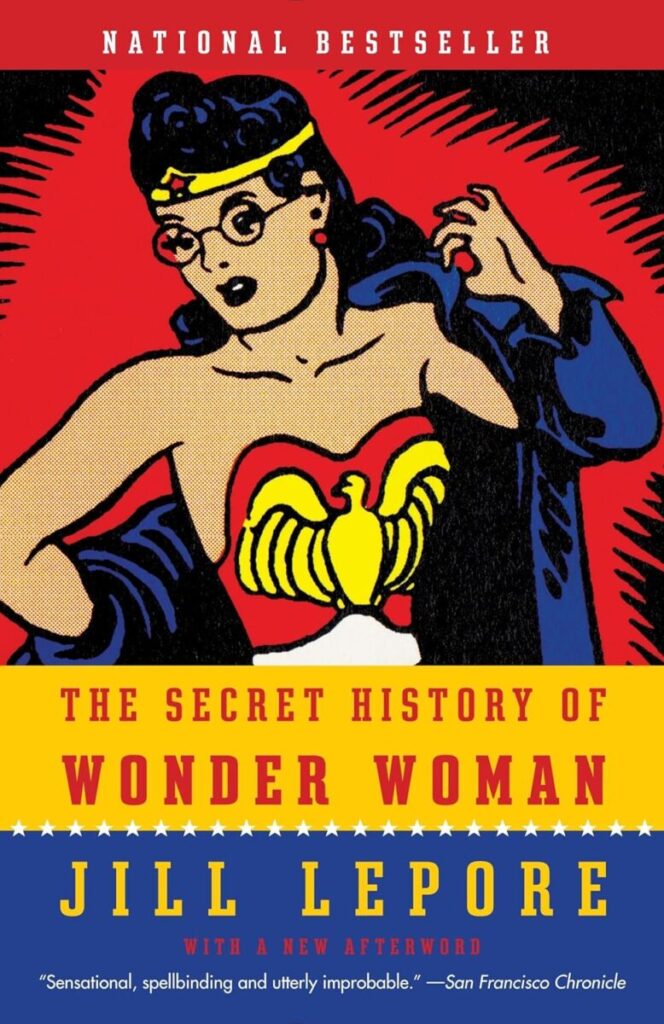 Cover art for the Secret History of Wonder Woman. The image is of the early Wonder Woman cartoon - wearing her Wonder Woman outfit, eye glasses, and a cape. The colors are bright red and blue with yellow highlights.
