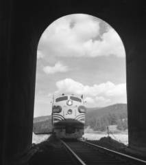 diesel locomotive entering tunnel