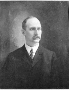A black and white photographic headshot of Governor Jesse F. McDonald