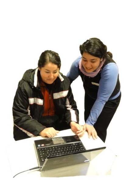 librarian helping a patron use her laptop