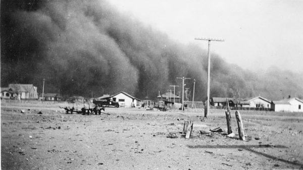 dark dust clouds over small town