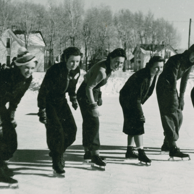 Photo of A group of six WSC coeds ready for a race on the ice skating rink, WSC campus, ca. early 1940s. 