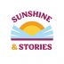 Sunshine and Stories podcast logo image of an open book with a sun rising from the middle of the pages
